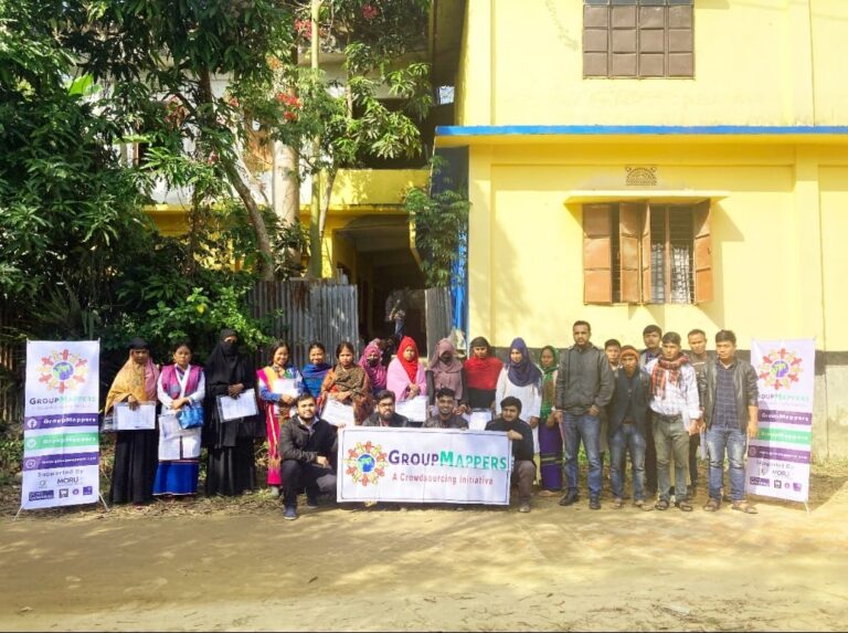 Image of volunteers working together on a community project. Join us and make a difference with GroupMappers' volunteer opportunities.